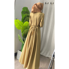 فستان طويل على الموضة الإسلامية للسيدات بلون سادة