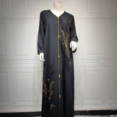 جلابية ساحرة مطرزة بالخرز، مرقعة، فضفاضة، تنضح بأناقة راقية كفستان ماكسي