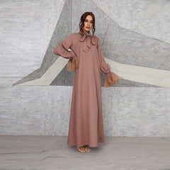Muslim women's long brown dress with beaded mesh cuffs