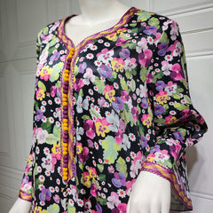 Jalabiya Experience the uniqueness of a floral-printed jalabiya adorned with handwoven accents providing a blend of softness , comfort and distinctiveness