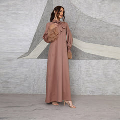 Muslim women's long brown dress with beaded mesh cuffs