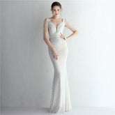 New sequined ladies banquet temperament V-neck show figure long aura queen dinner fishtail skirt