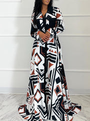 Foreign trade women's clothing 2023 autumn and winter new fashion print long-sleeved lace-up long skirt plus size European and American dresses.