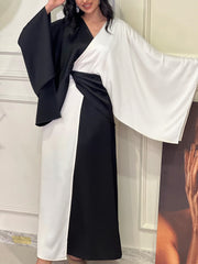 Elegant satin dress with black and white contrast stitching