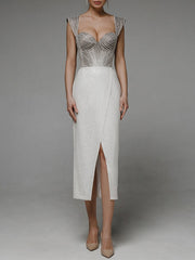 فستان بحمالات مثيرة للنساء من أوروبا وأمريكا مفتوح الظهر ومطرز على الورك