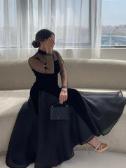 فستان أسود أنيق من الأورجانزا