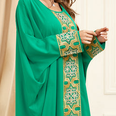 Jalabiya Comfortably elegant jalabiya with loose batwing sleeves and embroidered appliques