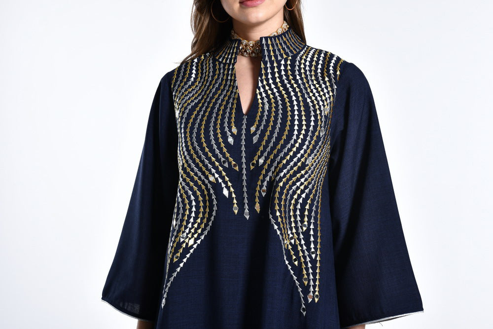 Jalabiya Experience the elegance and fashion-forward style of the loose-fitting jalabiya adorned with exquisite embroidery