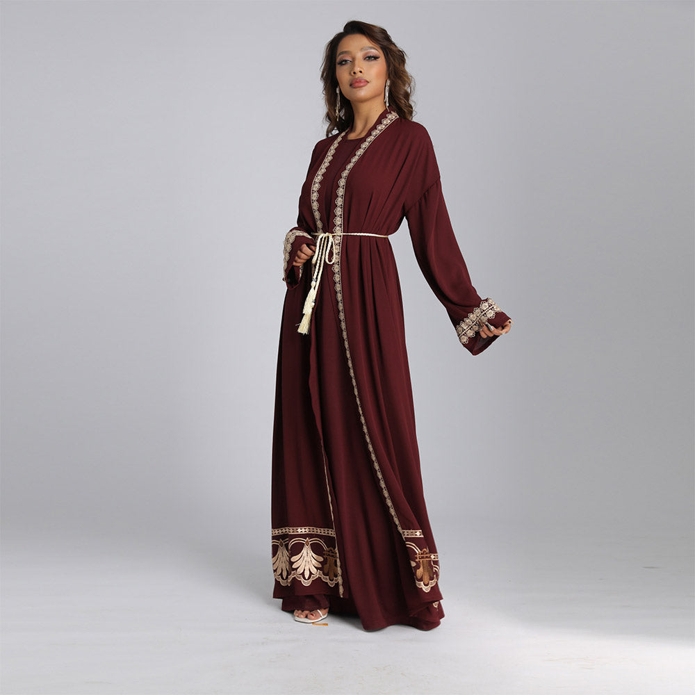 Elegant long robe with a solid color and embroidered waistline