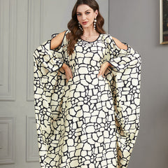 Loose-fitting jalabiya with batwing sleeves , Off-shoulder style , Black and white textured print