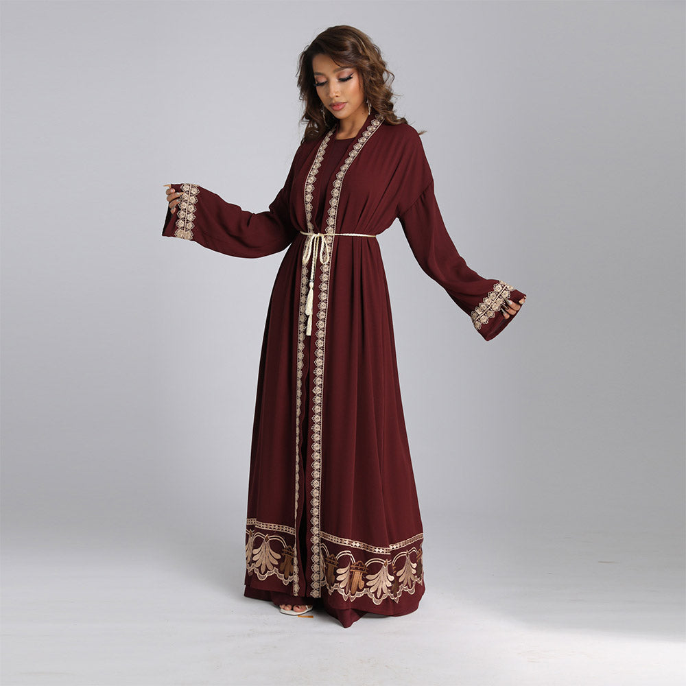 Elegant long robe with a solid color and embroidered waistline