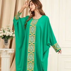 Jalabiya Comfortably elegant jalabiya with loose batwing sleeves and embroidered appliques