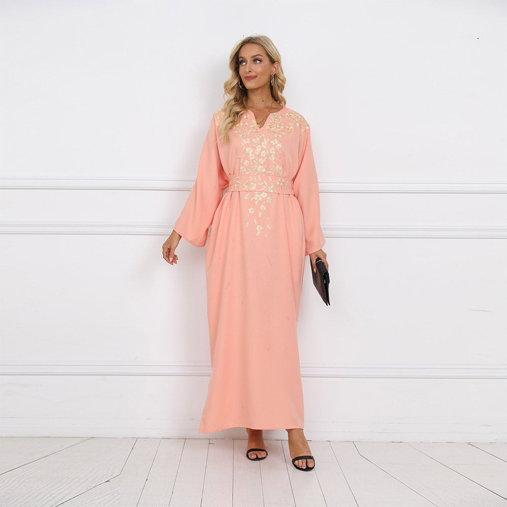 Embroidered pocketed elegant Muslim long dress with a cinched waist