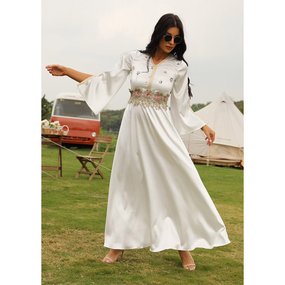 Muslim women's elegant long dress in pure white with long sleeves