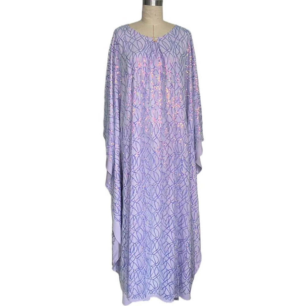 Muslim women's long dress with batwing sleeves, adorned with embroidered details and sparkling sequins, exuding an elegant and graceful charm