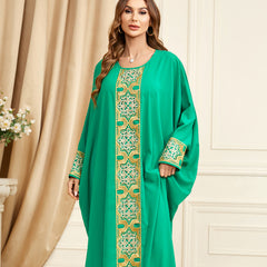 Jalabiya Comfortably elegant jalabiya with loose batwing sleeves and embroidered appliques