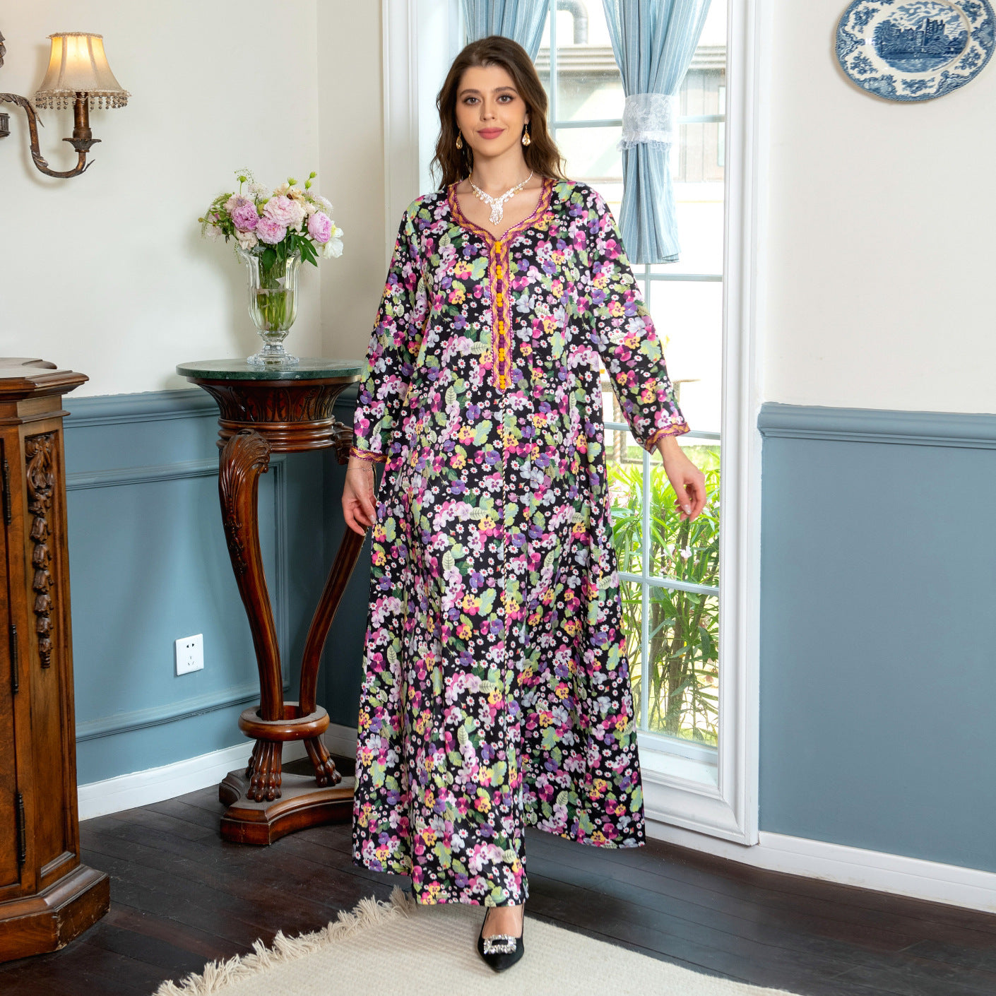 Jalabiya Experience the uniqueness of a floral-printed jalabiya adorned with handwoven accents providing a blend of softness , comfort  and distinctiveness