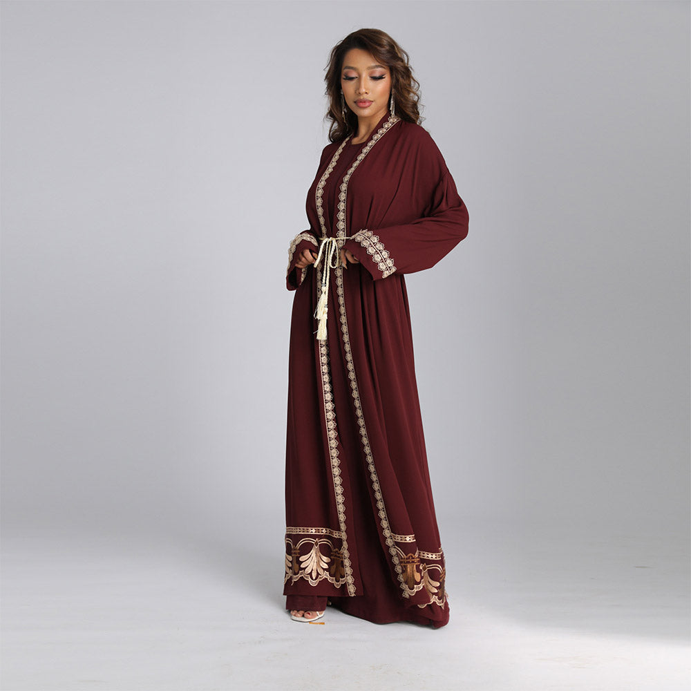 Elegant long robe with a solid color and embroidered waistline