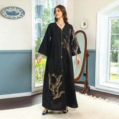 Enchanting jalabiya Beadwork embroidery, patchwork, loose-fitting, exudes refined elegance as a maxi dress