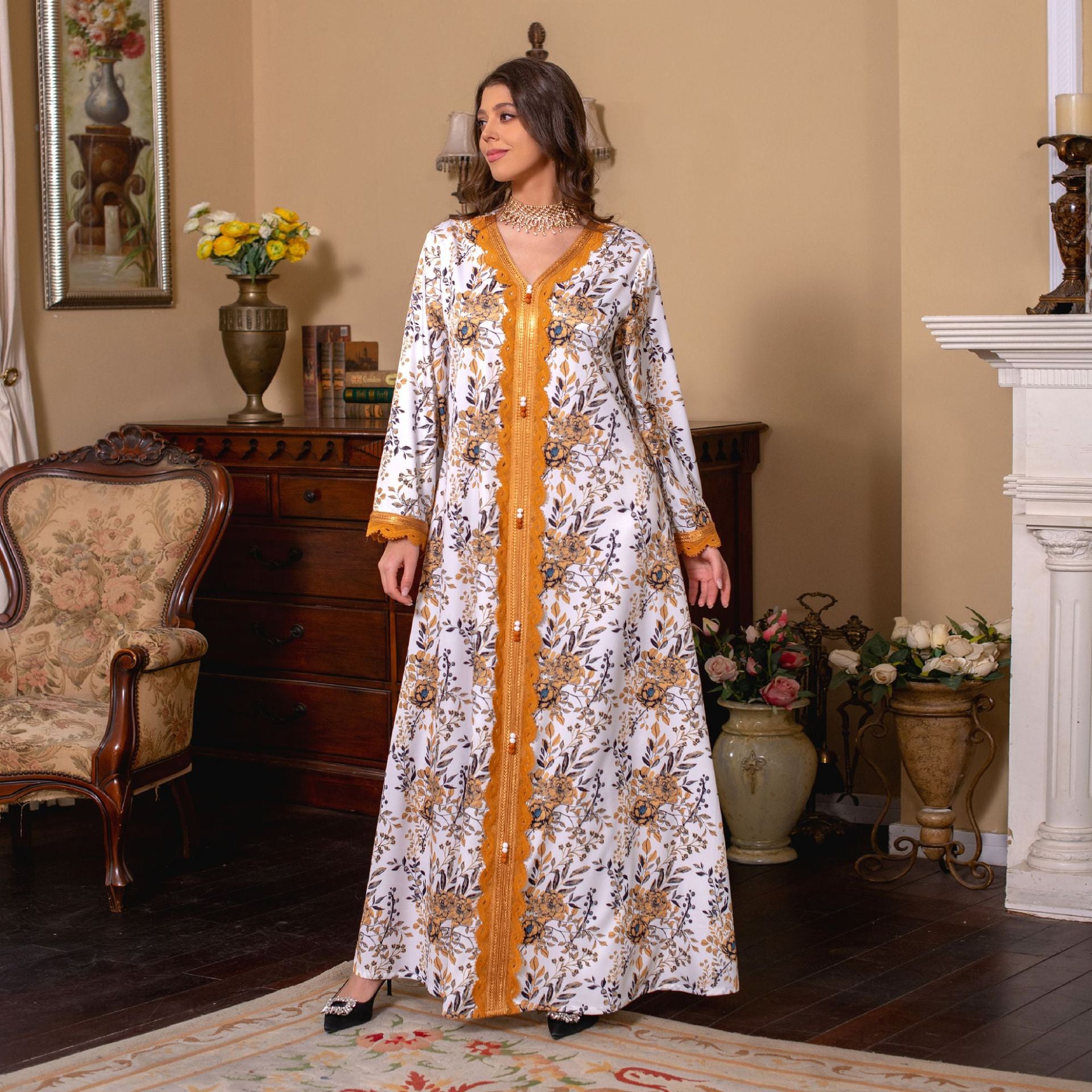 Immerse yourself in the comfort of a printed jalabiya, featuring a relaxed, flowy silhouette , intricate lace trimmings , and a casual yet stylish design