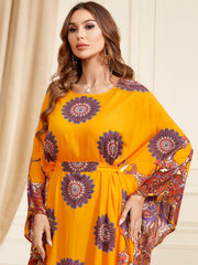 Jalabiya Flatter your figure with a waist-cinching jalabiya, featuring loose batwing sleeves and a touch of luxury in the print