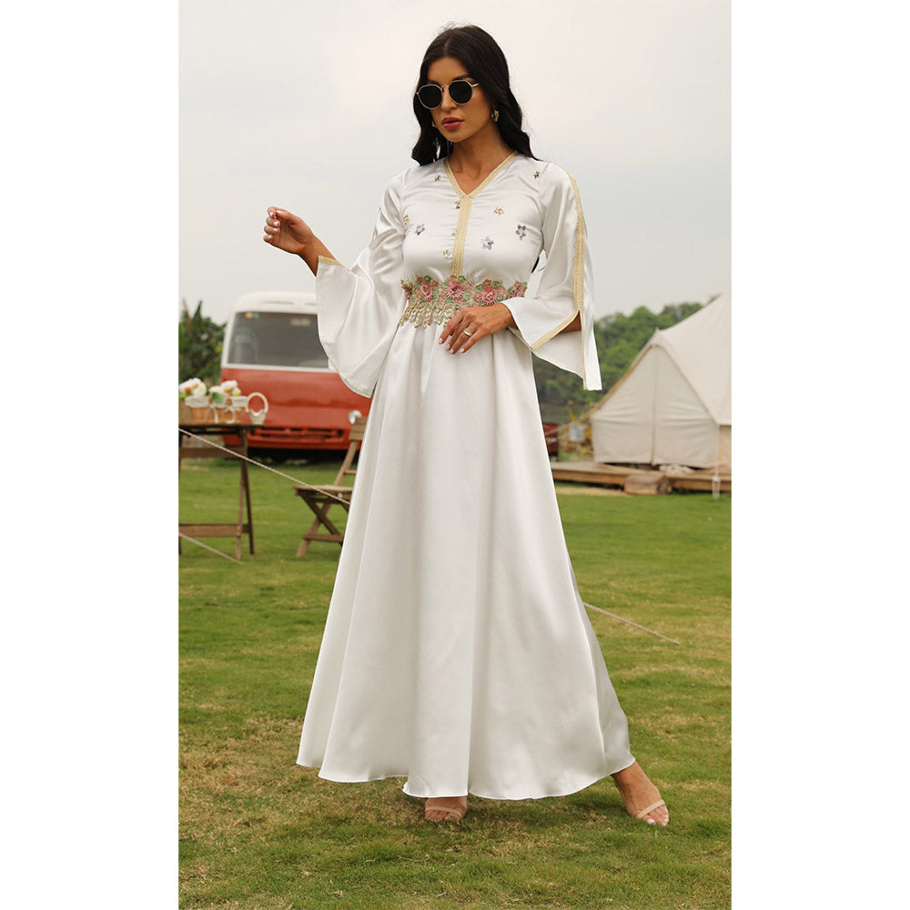 Muslim women's elegant long dress in pure white with long sleeves