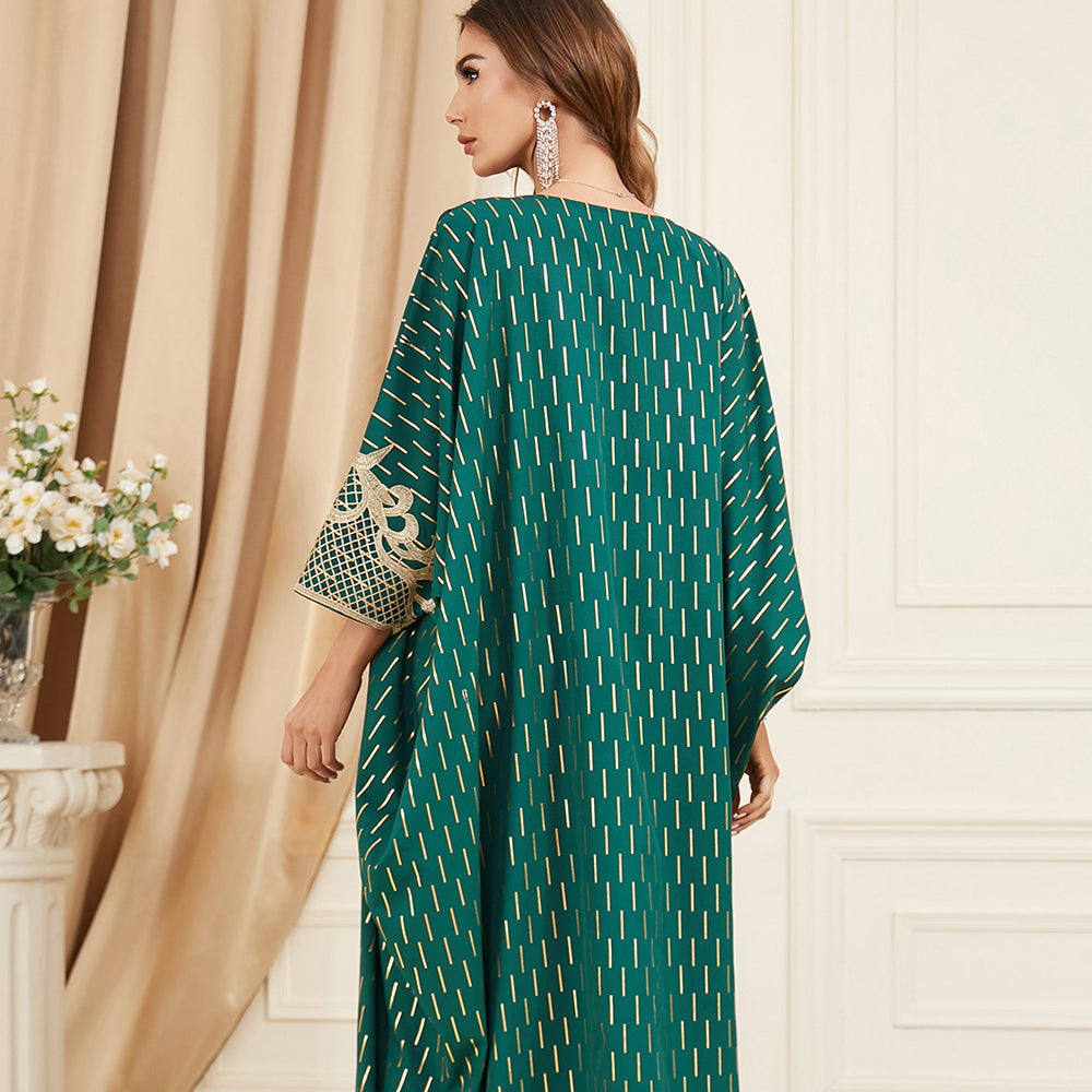 Unique style unfolds in a jalabiya , Adorned with golden foil accents , Embroidered appliques , Fringe detailing, Exuding a distinctive charm