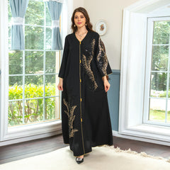 Enchanting jalabiya Beadwork embroidery, patchwork, loose-fitting, exudes refined elegance as a maxi dress