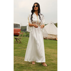 Muslim women's elegant long dress in pure white with long sleeves