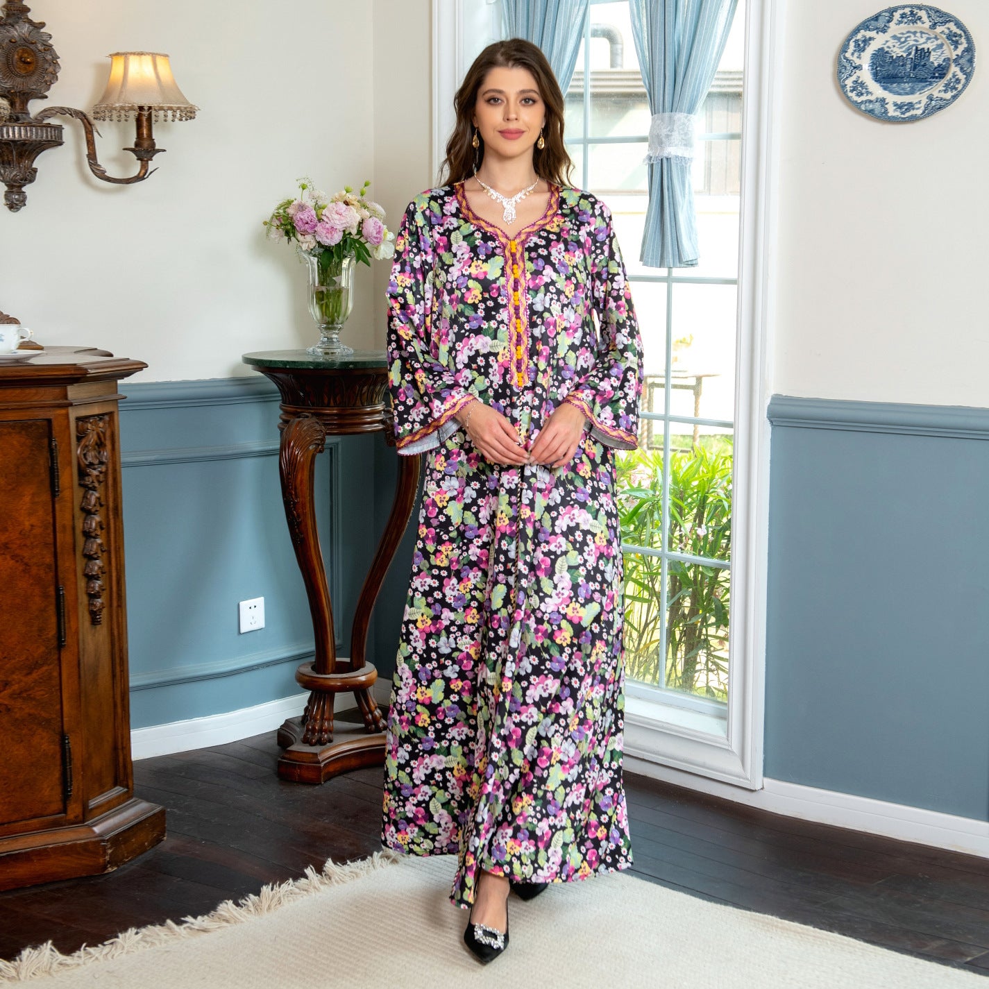 Jalabiya Experience the uniqueness of a floral-printed jalabiya adorned with handwoven accents providing a blend of softness , comfort  and distinctiveness