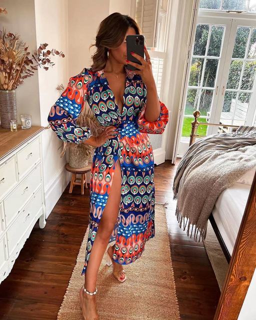 فستان نسائي مثير بفتحة على الخصر ورقبة على شكل حرف V 