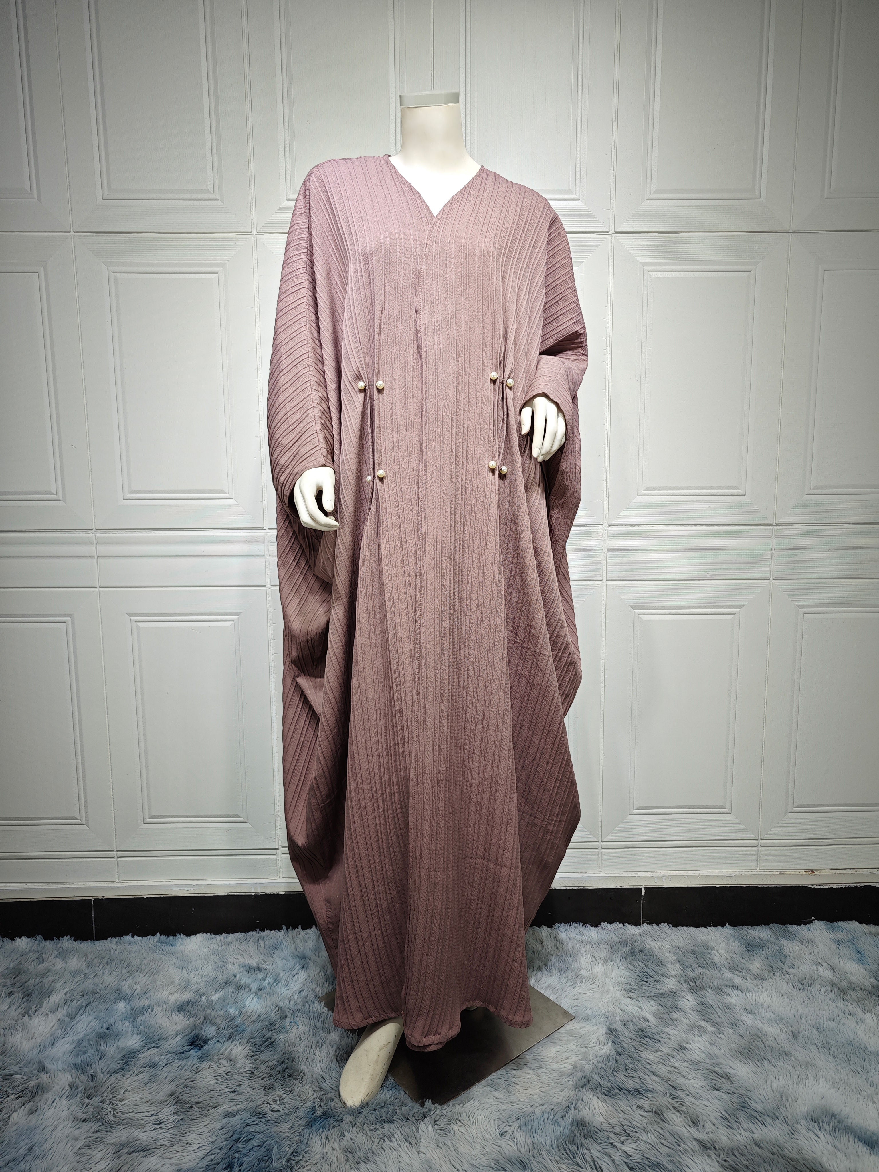 Middle Eastern Arab robe modest2023 Muslim Dubai fashion European solid color striped bat sleeve casual large size cardigan