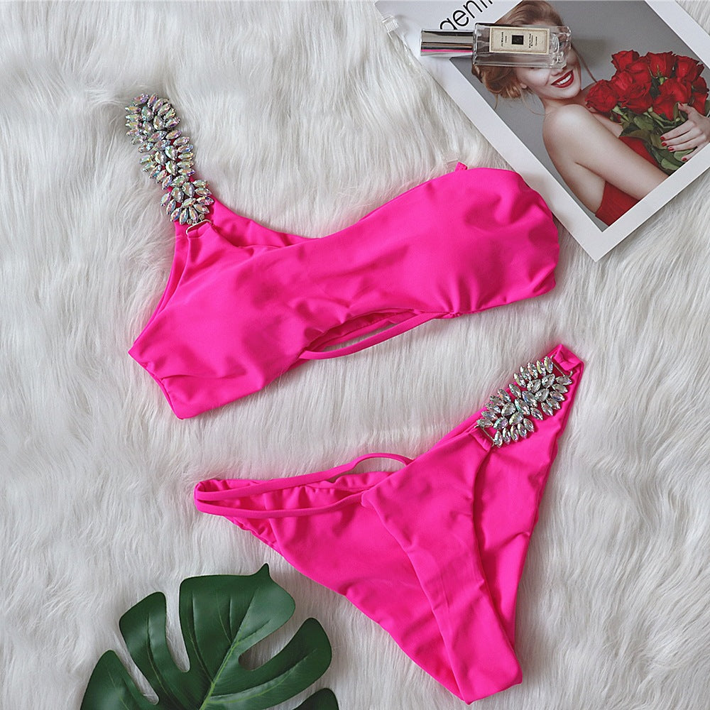 European and American bikini sexy crystal diamond bandage hollow solid color split female swimsuit one shoulder swimsuit