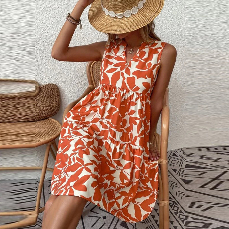 فساتين صيفية أنيقة للسيدات بطباعة نباتية وفتحة رقبة على شكل V فستان مكشكش بوهو بدون أكمام فضفاض لقضاء إجازة الشاطئ وتنورة قصيرة