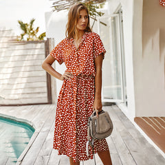 فستان بوهو أنيق منقط بلون سادة فستان نسائي صيفي كاجوال بحزام وزر ربط طويل وطية صدر السترة 