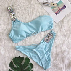 European and American bikini sexy crystal diamond bandage hollow solid color split female swimsuit one shoulder swimsuit