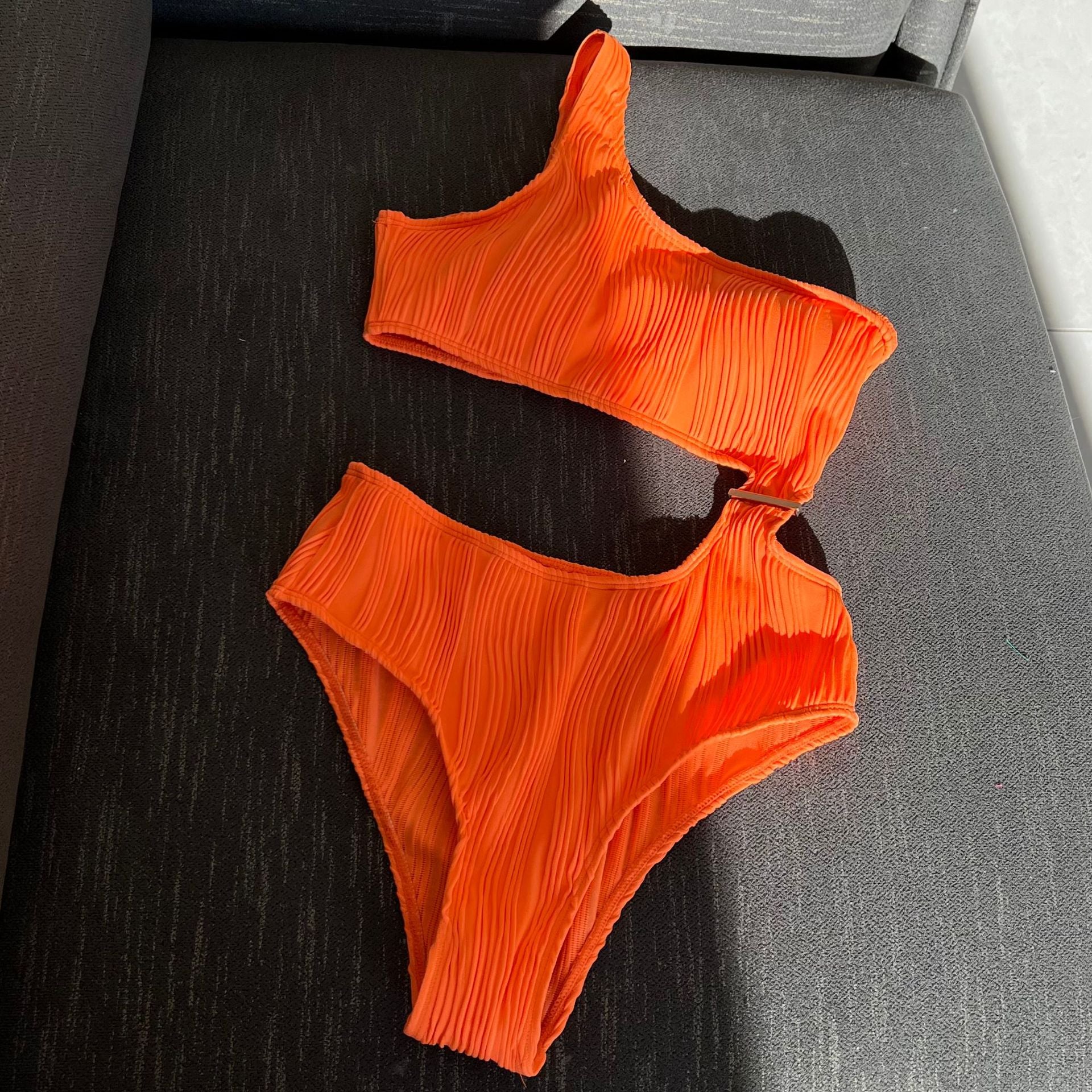 New textured cloth sexy hollow one-piece swimsuit bikini.