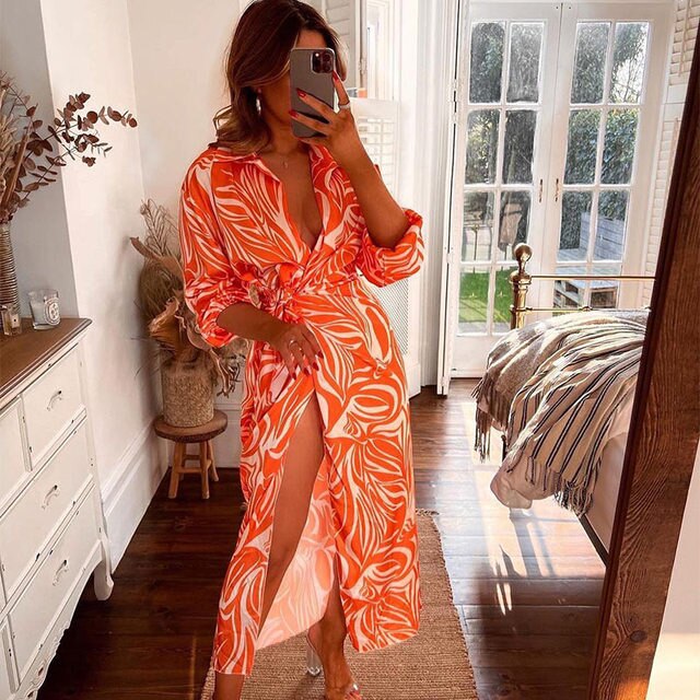 فستان نسائي مثير بفتحة على الخصر ورقبة على شكل حرف V 