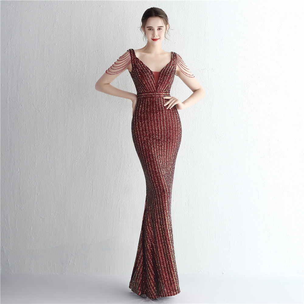 New sequined ladies banquet temperament V-neck show figure long aura queen dinner fishtail skirt