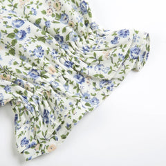 فستان صيفي قصير أنيق على شكل حرف A للنساء فستان شاطئ بأكمام قصيرة ومكشكش مطبوع عليه زهور فستان صيفي بوهو برقبة دائرية مع حزام 