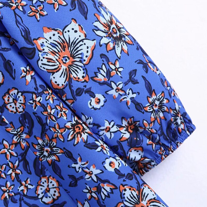 فستان ميدي بنمط بوهو مطبوع عليه زهور فستان نسائي بفتحة رقبة على شكل V وأكمام طويلة فستان نسائي أنيق مربوط بفيونكة على شكل حرف A 