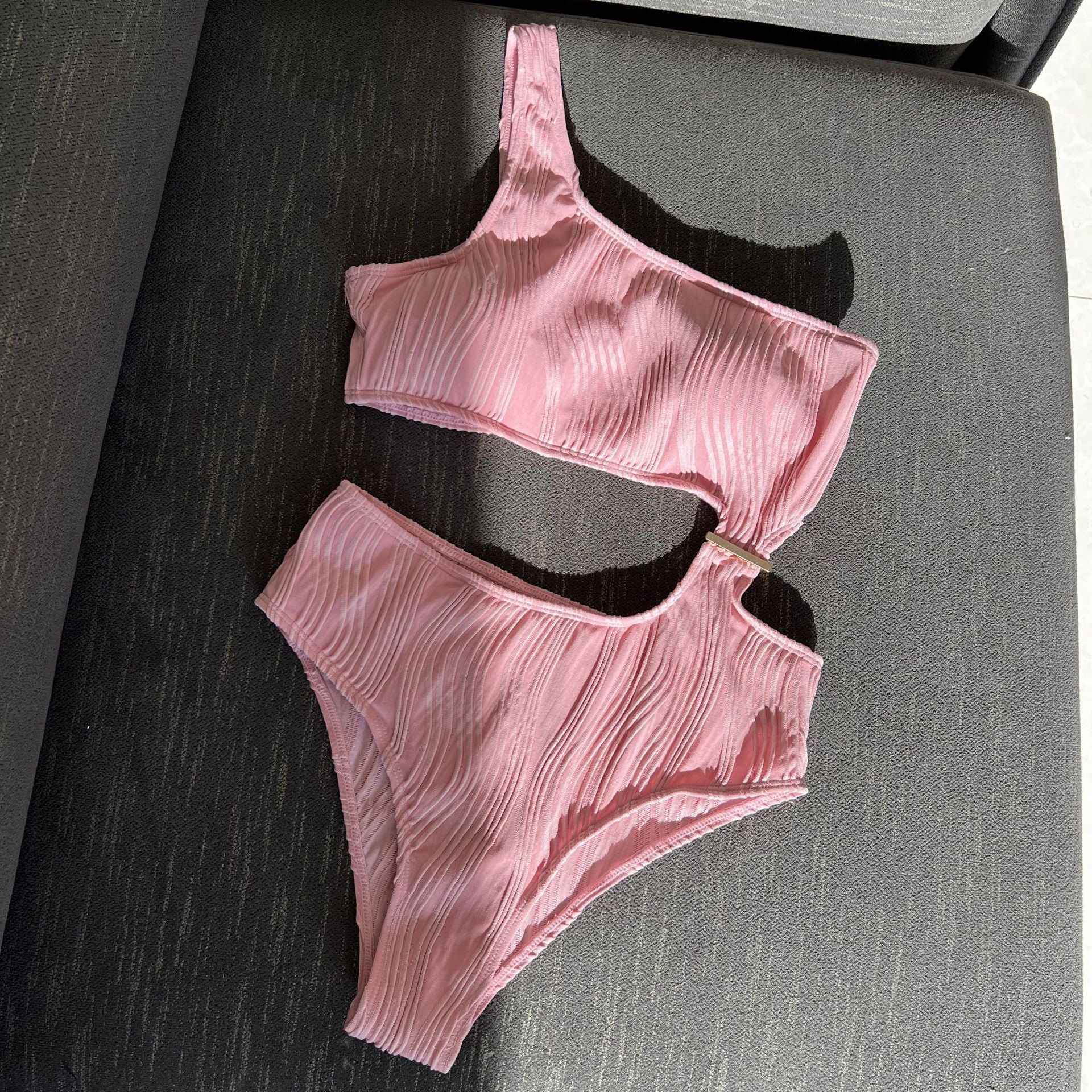 New textured cloth sexy hollow one-piece swimsuit bikini.
